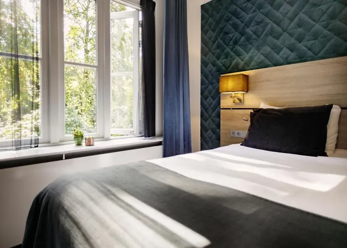 Restaurant De Wolfsberg Hotell Berg en Dal